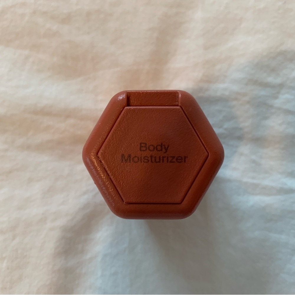 Cadence 1.32 oz body moisturizer travel container